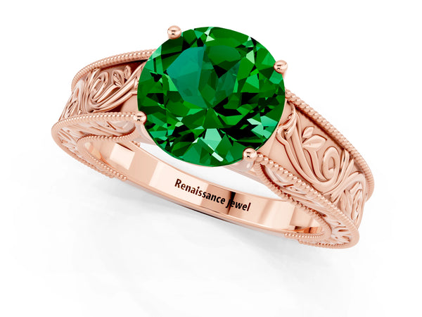 Rose gold Round Cut Emerald Solitaire Ring with Engraved Band and Four-Prong Setting