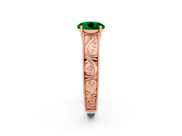 Rose gold Round Cut Emerald Solitaire Ring with Engraved Band and Four-Prong Setting