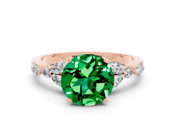 Rose gold Round Cut Emerald Solitaire Ring with Side Stones and Four-Prong Setting