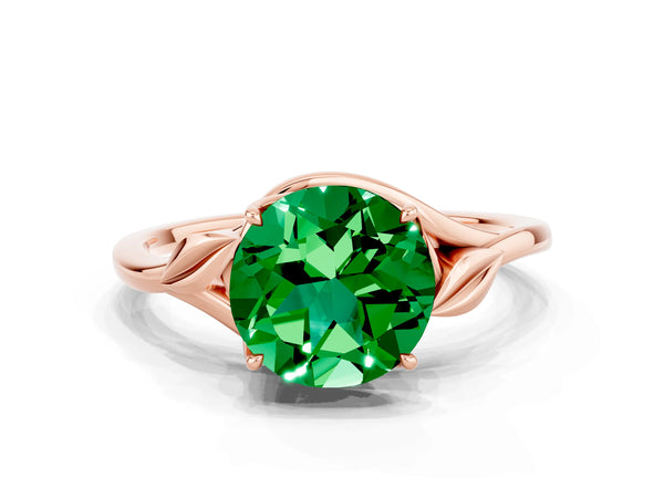 Rose gold Round Cut Emerald Solitaire Ring with Twist Band and Four-Prong Setting