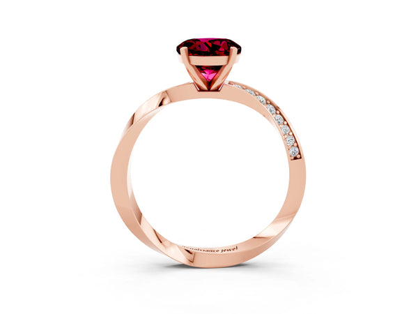 Rose gold Round Cut Garnet Engagement Ring with Side Stone Accents and Four-Prong Setting