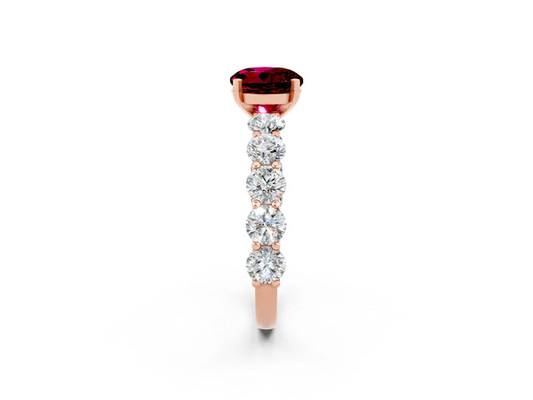 Rose gold Round Cut Garnet Prong Setting with Side Stones on a Pave Band