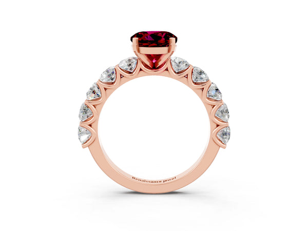 Rose gold Round Cut Garnet Prong Setting with Side Stones on a Pave Band