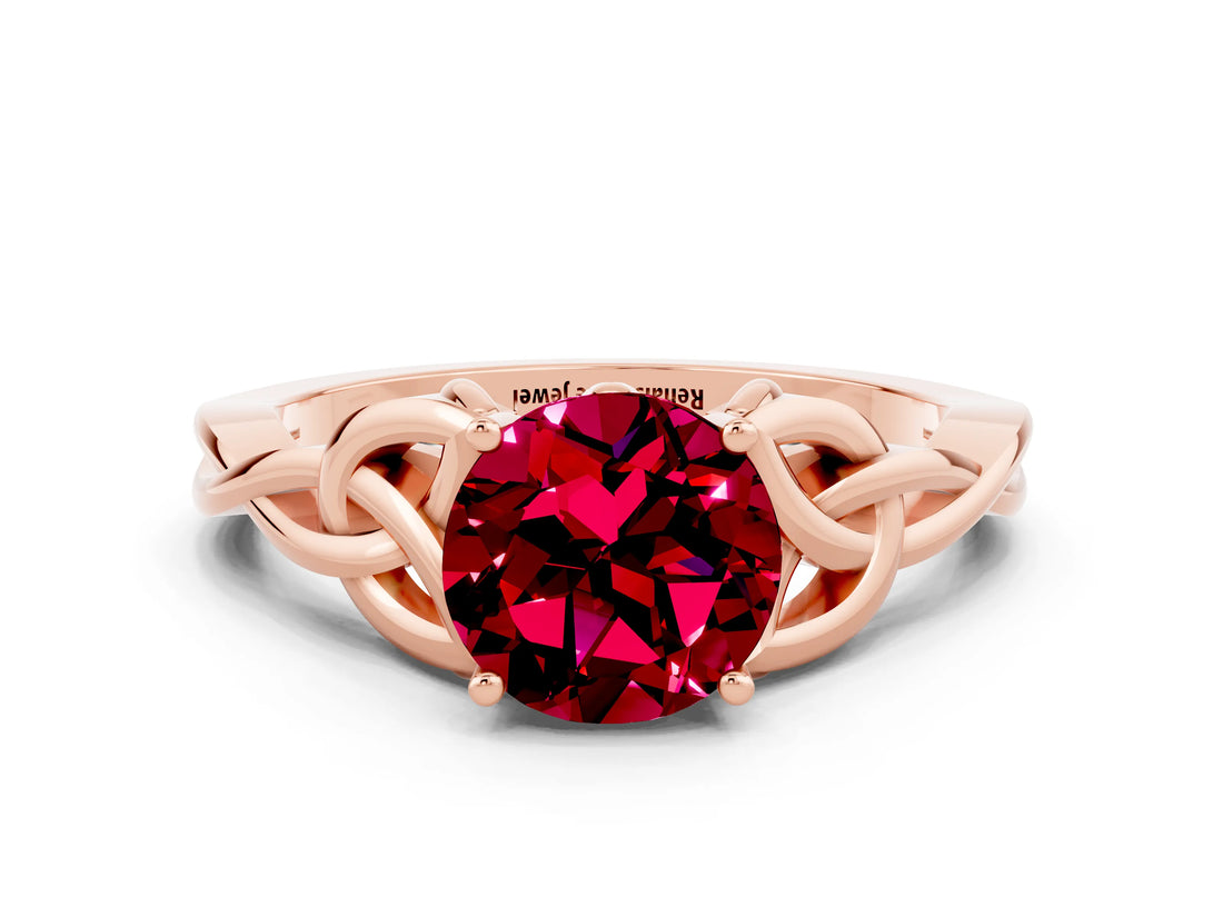 Rose gold Round Cut Garnet Solitaire Engagement Ring with Celtic Knot Band and Four-Prong Setting