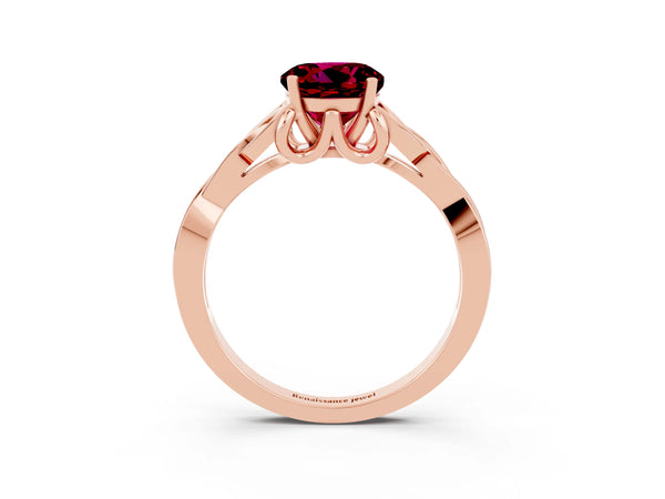 Rose gold Round Cut Garnet Solitaire Engagement Ring with Celtic Knot Band and Four-Prong Setting
