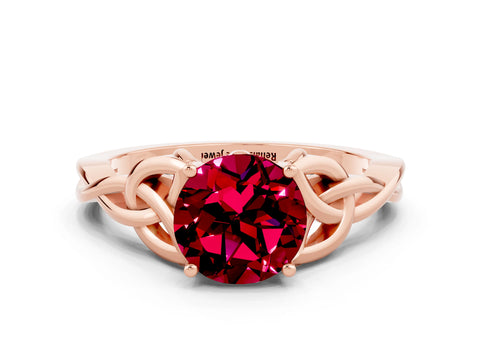 Rose gold Round Cut Garnet Solitaire Engagement Ring with Celtic Knot Band and Four-Prong Setting