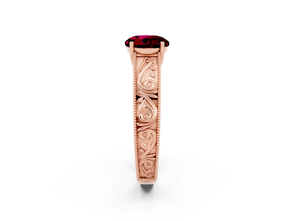 Rose gold Round Cut Garnet Solitaire Ring with Engraved Band and Four-Prong Setting