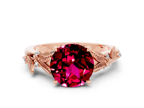 Rose gold Round Cut Garnet Solitaire Ring with Leaf Motif Band and Four-Prong Setting