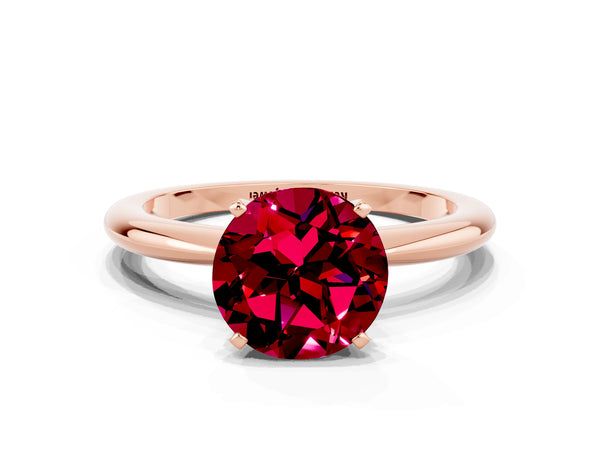 Rose gold Round Cut Garnet Solitaire Ring with Six-Prong Setting and Classic Band
