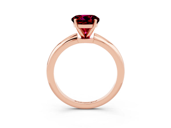 Rose gold Round Cut Garnet Solitaire Ring with Six-Prong Setting and Classic Band