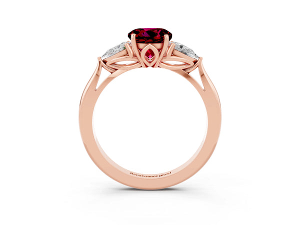 Rose gold Round Cut Garnet Three-Stone Ring with Pear  Side Stones and Prong Setting