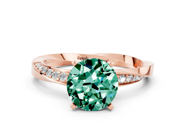 Rose gold Round Cut Green Sapphire Engagement Ring with Side Stone Accents and Four-Prong Setting