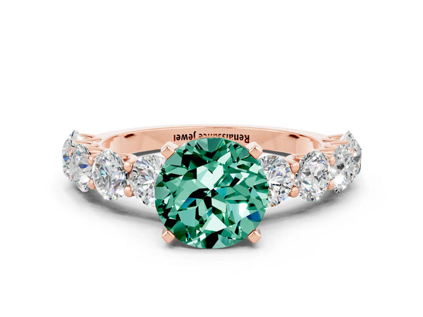 Rose gold Round Cut Green Sapphire Prong Setting with Side Stones on a Pave Band