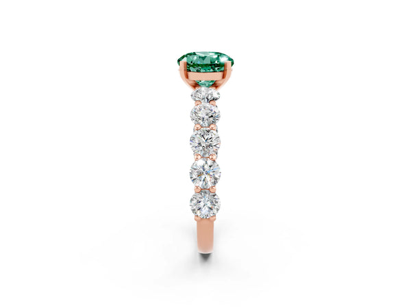Rose gold Round Cut Green Sapphire Prong Setting with Side Stones on a Pave Band