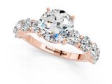 Rose gold Round Cut Moissanite Prong Setting with Side Stones on a Pave Band_1