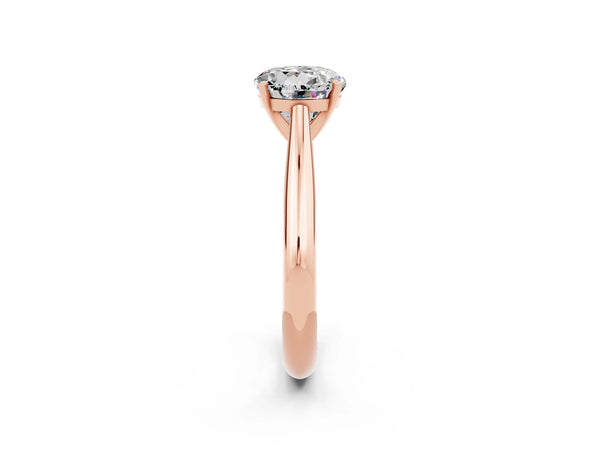 Rose gold Round Cut Moissanite Solitaire Engagement Ring with Cathedral Setting and Four-Prong Mount