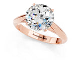 Rose gold Round Cut Moissanite Solitaire Engagement Ring with Cathedral Setting and Four-Prong Mount_25