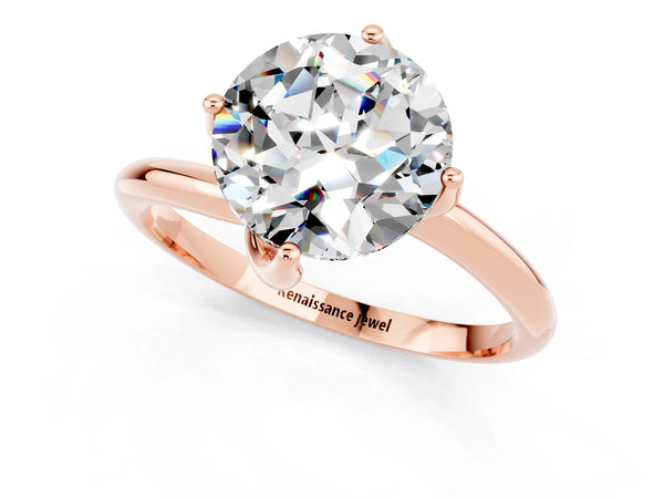 Rose gold Round Cut Moissanite Solitaire Engagement Ring with Four-Prong Setting and Classic Band