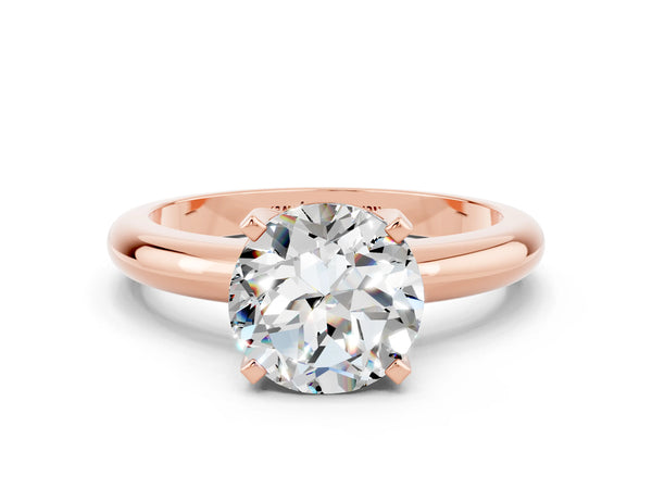 Rose gold Round Cut Moissanite Solitaire Engagement Ring with Round Band and Four-Prong Setting