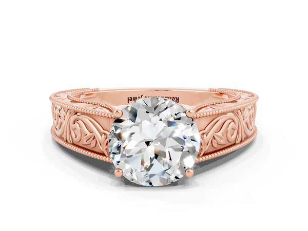 Rose gold Round Cut Moissanite Solitaire Ring with Engraved Band and Four-Prong Setting