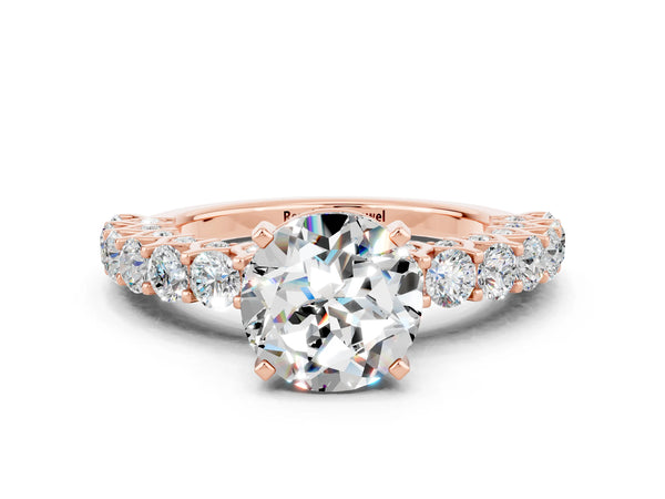 Rose gold Round Cut Moissanite Solitaire Ring with Shared Prong Pavé Band and Four-Prong Setting