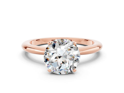 Rose gold Round Cut Moissanite Solitaire Ring with Six-Prong Setting and Classic Band