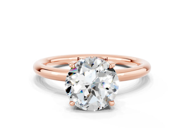 Rose gold Round Cut Moissanite Solitaire Ring with Thin Band and Four-Prong Setting