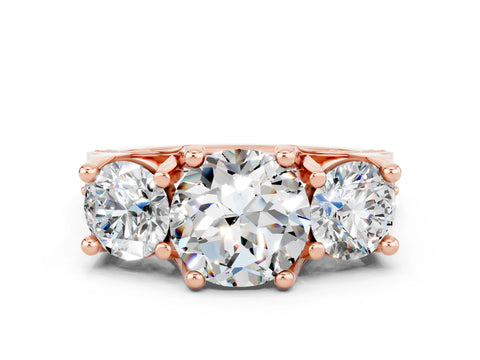 Rose gold Round Cut Moissanite Three-Stone Ring with Channel Set Band and Four-Prong Setting