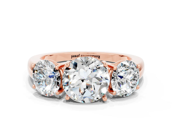 Rose gold Round Cut Moissanite Three-Stone Ring with Four-Prong Setting and Classic Band