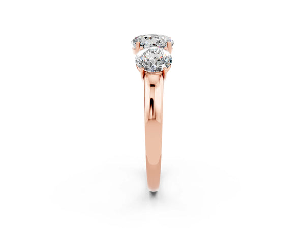 Rose gold Round Cut Moissanite Three-Stone Ring with Four-Prong Setting and Classic Band