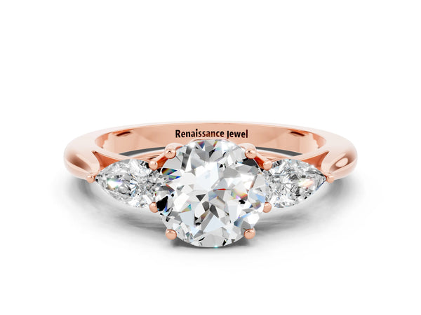 Rose gold Round Cut Moissanite Three-Stone Ring with Pear  Side Stones and Prong Setting