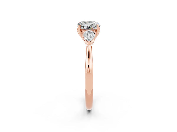 Rose gold Round Cut Moissanite Three-Stone Ring with Pear  Side Stones and Prong Setting