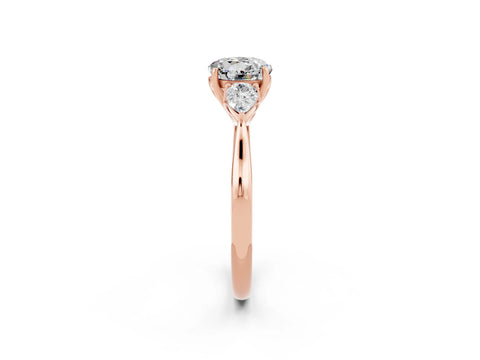 Rose gold Round Cut Moissanite Three-Stone Ring with Pear Side Stones and Four-Prong Setting_14