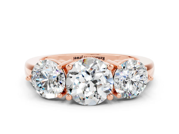 Rose gold Round Cut Moissanite Three-Stone Ring with Prong Setting and Classic Band