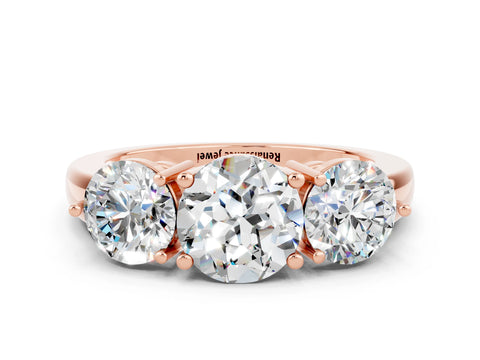 Rose gold Round Cut Moissanite Three-Stone Ring with Prong Setting and Classic Band