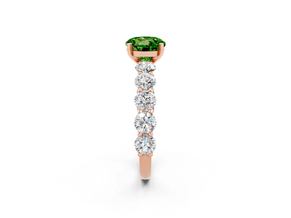 Rose gold Round Cut Peridot Prong Setting with Side Stones on a Pave Band
