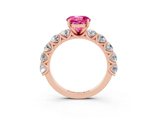Rose gold Round Cut Pink Sapphire Prong Setting with Side Stones on a Pave Band