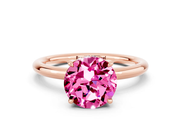 Rose gold Round Cut Pink Sapphire Solitaire Ring with Thin Band and Four-Prong Setting