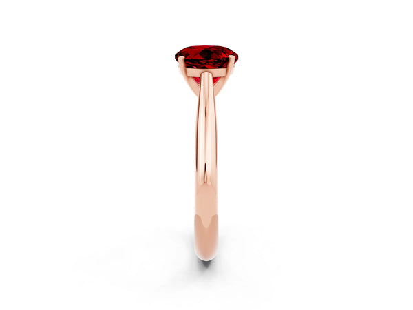 Rose gold Round Cut Ruby Solitaire Engagement Ring with Cathedral Setting and Four-Prong Mount