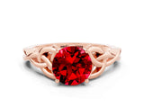 Rose gold Round Cut Ruby Solitaire Engagement Ring with Celtic Knot Band and Four-Prong Setting