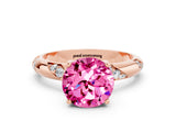 Rose gold Round Cut Solitaire Diamond Engagement Ring with Twisted Pave Band and Four-Prong Setting