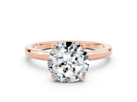 Rose gold Round Cut Solitaire Diamond Ring with Thin Band and Four-Prong Setting