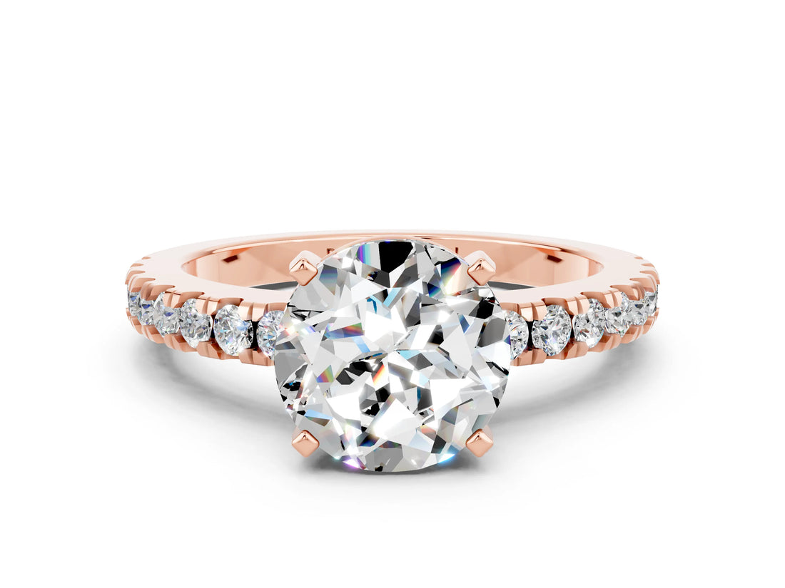 Rose gold Round Cut Solitaire Diamond with Pavé Band and Four-Prong Setting