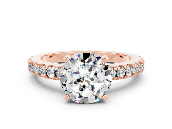 Rose gold Round Cut Solitaire Moissanite with Pavé Band and Four-Prong Setting