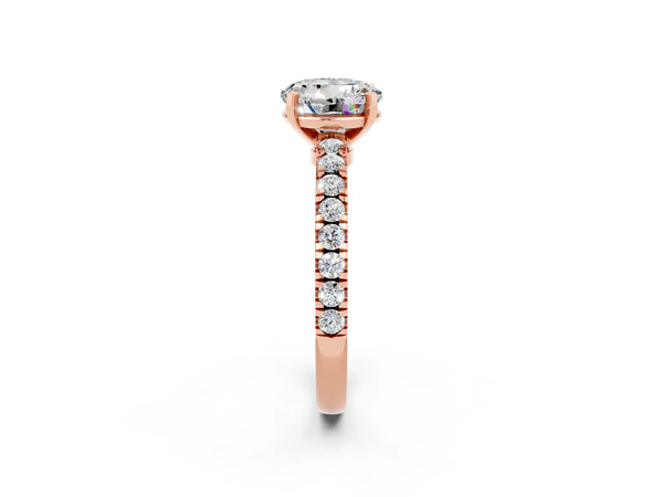 Rose gold Round Cut Solitaire Moissanite with Pavé Band and Four-Prong Setting