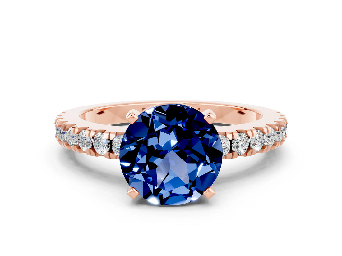 Rose gold Round Cut Solitaire Diamond with Pavé Band and Four-Prong Setting