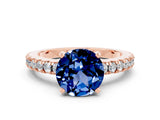 Rose gold Round Cut Solitaire Diamond with Pavé Band and Four-Prong Setting