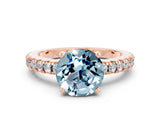Rose gold Round Cut Solitaire Diamond with Pavé Band and Four-Prong Setting