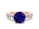 Rose gold Round Cut Solitaire Diamond with Pavé Band and Four-Prong Setting