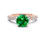 Rose gold Round Cut Solitaire Emerald Ring with Pave Band and Four-Prong Setting
